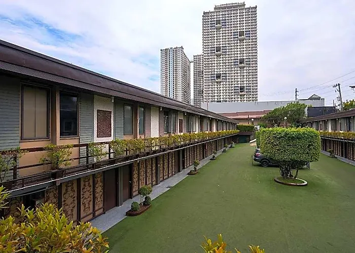 호텔 Victoria Court Escarpment - Pasig 마닐라